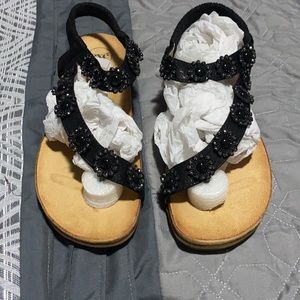 Exe rhinestone short wedge sandal with toe thong.